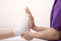 Foot Doctor Bandaging Foot